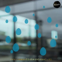 Raamsticker Pasen paasei confetti transparant blauw copyright ®raamstickerwinkel